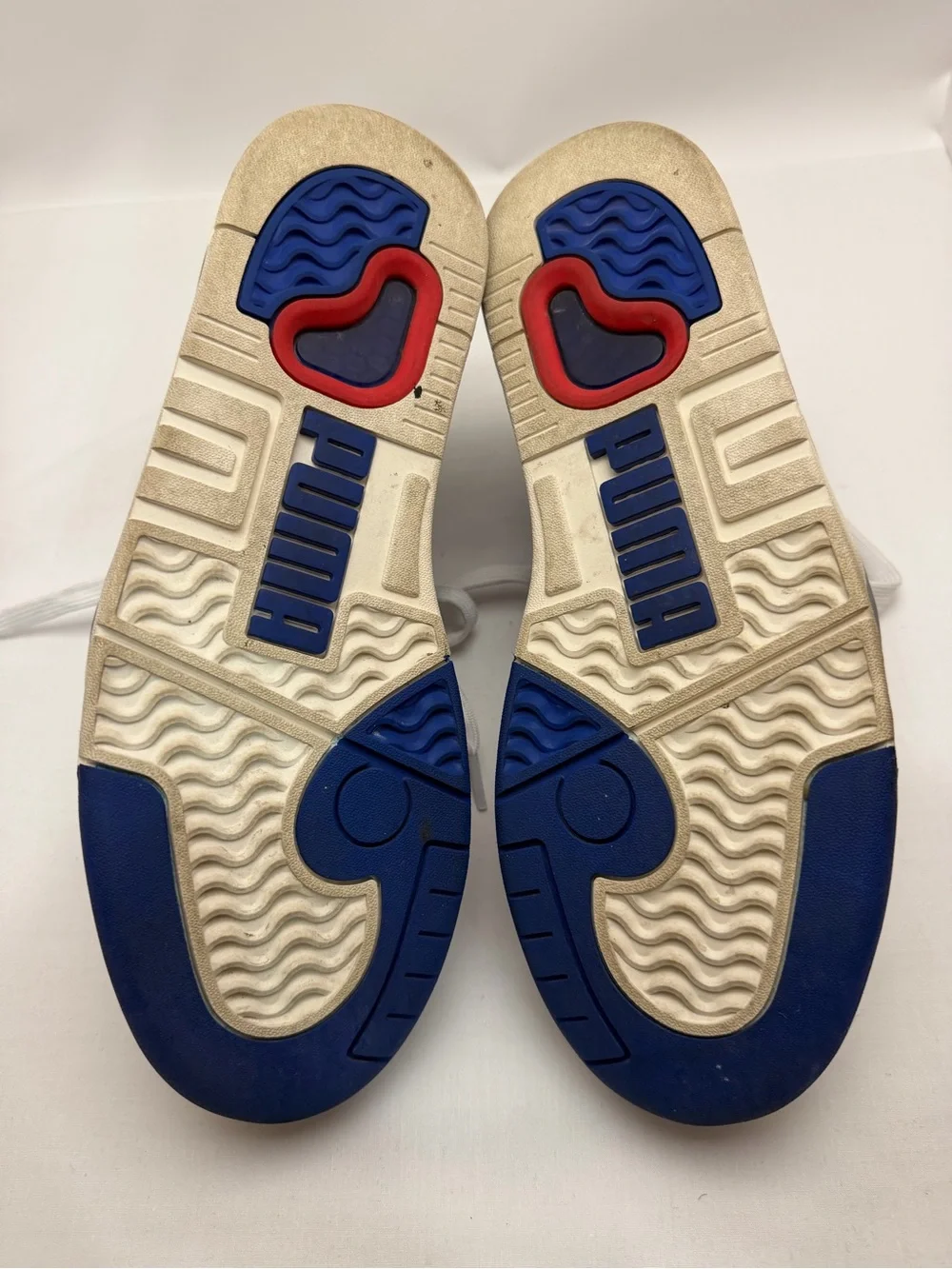 Puma White Athletic Sneakers with Blue and Red Accents
